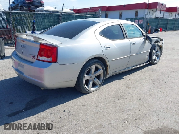 2009 Dodge Charger R/T with VIN 2B3LA53T89H610073, listed as a IAAI auction lot 41812611 with 135,364 mi miles. Bid and sale history available at carsss.com. Image 4.