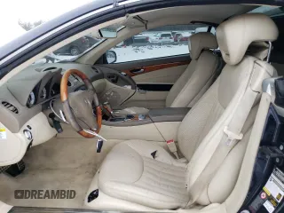 2009 Mercedes-Benz SL 550 with VIN WDBSK71F09F153162, listed as a Copart auction lot 88884365 with 155,973 mi miles and Salvage title. Bid and sale history available at DreamBid. Image 7.