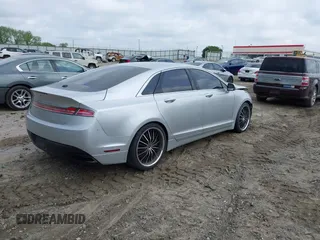 2015 Lincoln MKZ with VIN 3LN6L2G90FR616254, listed as a IAAI auction lot 42083112 with 191,803 mi miles. Bid and sale history available at carsss.com. Image 4.