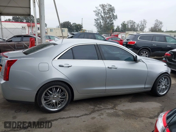 2013 Cadillac ATS Luxury z VIN 1G6AB5RX9D0156834, wystawiony jako IAAI lot #41870392 z przebiegiem 60 952 mil mil oraz . Historia ofert i sprzedaży dostępna na DreamBid. Obrazek 14.