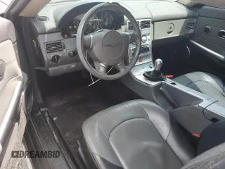 2004 Chrysler Crossfire z VIN 1C3AN69L84X014803, wystawiony jako Copart lot #56139015 z przebiegiem 102 523 mil mil oraz Szkoda całkowita • Salvage title. Historia ofert i sprzedaży dostępna na DreamBid. Obrazek 8.