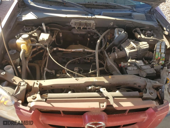 2006 Mazda Tribute i with VIN 4F2YZ02Z46KM16571, listed as a Copart auction lot 80926274 with 245,836 mi miles and Salvage Title. Bid and sale history available at carsss.com. Image 11.