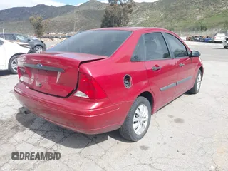 2003 Ford Focus LX with VIN 1FAFP33P03W177932, listed as a IAAI auction lot 41720755 with 182,415 mi miles and . Bid and sale history available at carsss.com. Image 4.