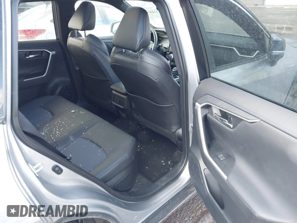 2021 Toyota RAV4 Hybrid XSE with VIN 4T3E6RFV8MU059858, listed as a IAAI auction lot 41423611 with 14,281 mi miles and . Bid and sale history available at DreamBid. Image 8.