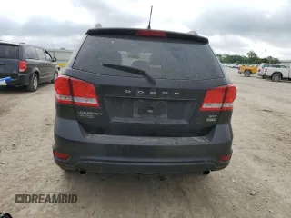 2012 Dodge Journey SXT z VIN 3C4PDCBG2CT314562, wystawiony jako Copart lot #57500195 z przebiegiem 156 319 mil mil oraz Szkoda całkowita • Salvage title. Historia ofert i sprzedaży dostępna na DreamBid. Obrazek 6.