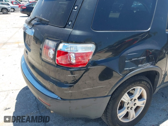 2010 GMC Acadia SL with VIN 1GKLRKED2AJ152923, listed as a IAAI auction lot 42036977 with 108,285 mi miles. Bid and sale history available at carsss.com. Image 6.