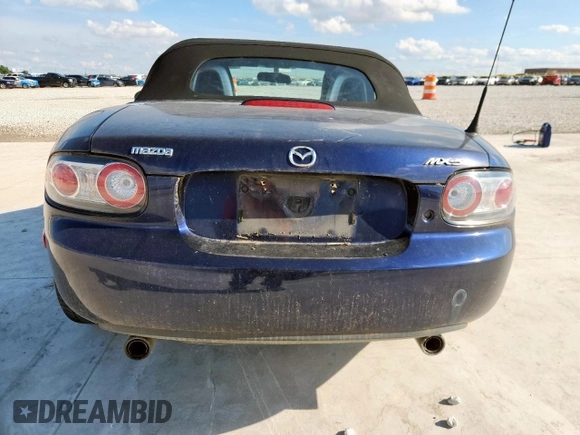 2007 Mazda MX-5 Miata Touring with VIN JM1NC25F770138120, listed as a Copart auction lot 60777425 with 184,029 mi miles and Salvage title. Bid and sale history available at DreamBid. Image 6.