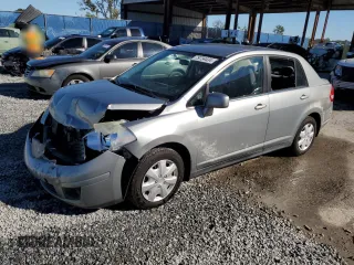 2009 Nissan Versa 1.8 S with VIN 3N1BC11E59L375868, listed as a Copart auction lot 79734434 with 84,680 mi miles and Salvage Title. Bid and sale history available at carsss.com. Image 1.