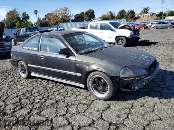 1996 Honda Civic DX with VIN 1HGEJ6126TL006590, listed as a Copart auction lot 79457604 with 186,293 mi miles and Salvage Title. Bid and sale history available at carsss.com. Image 4.