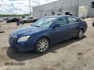 2007 Toyota Avalon XL z VIN 4T1BK36B97U185032, wystawiony jako Copart lot #56156265 z przebiegiem 207 367 mil mil oraz Czysty tytuł • Clean title. Historia ofert i sprzedaży dostępna na DreamBid. Obrazek 1.