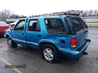 1995 Chevrolet Blazer z VIN 1GNDT13W4S2154787, wystawiony jako Copart lot #85719274 z przebiegiem 167 242 mil mil oraz Nie do naprawy • Non repairable. Historia ofert i sprzedaży dostępna na DreamBid. Obrazek 2.