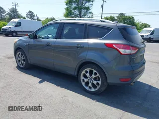 2015 Ford Escape Titanium with VIN 1FMCU0J94FUB24350, listed as a IAAI auction lot 42065641 with 168,215 mi miles. Bid and sale history available at carsss.com. Image 3.