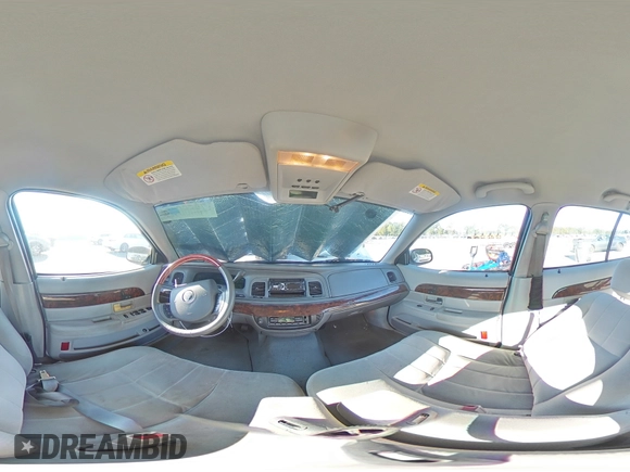 2005 Mercury Grand Marquis LS Premium z VIN 2MEFM75WX5X607647, wystawiony jako Copart lot #73566194 z przebiegiem 206 152 mil mil oraz Szkoda całkowita • Salvage title. Historia ofert i sprzedaży dostępna na DreamBid. Obrazek 12.