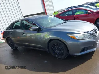2016 Nissan Altima SV with VIN 1N4AL3AP5GC166005, listed as a IAAI auction lot 41795548 with 111,942 mi miles and . Bid and sale history available at DreamBid. Image 13.