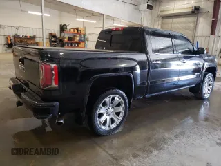 2017 GMC Sierra 1500 Denali z VIN 3GTU2PEJ7HG243799, wystawiony jako Copart lot #53297915 z przebiegiem 98 580 mil mil oraz Szkoda całkowita • Salvage title. Historia ofert i sprzedaży dostępna na DreamBid. Obrazek 3.