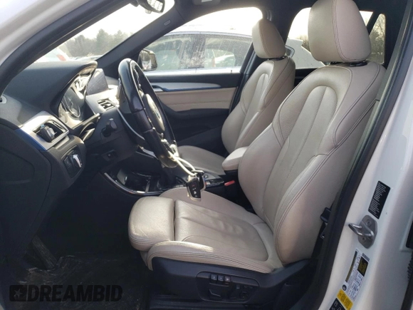 2017 BMW X1 xDrive28i with VIN WBXHT3C3XH5F77236, listed as a Copart auction lot 46406215 with 156,446 mi miles and Salvage Title. Bid and sale history available at DreamBid. Image 7.