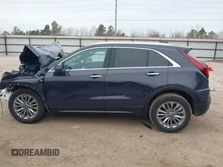 2025 Cadillac XT4 FWD Premium Luxury z VIN 1GYFZCR40SF148814, wystawiony jako IAAI lot #41598124 z przebiegiem Nie podano mil oraz . Historia ofert i sprzedaży dostępna na DreamBid. Obrazek 15.