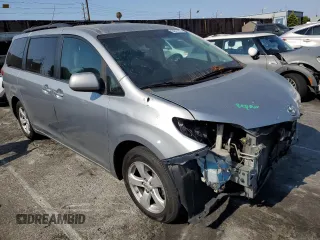 2011 Toyota Sienna LE AAS with VIN 5TDKK3DC6BS054847, listed as a Copart auction lot 64673975 with 197,266 mi miles and Salvage title. Bid and sale history available at DreamBid. Image 4.