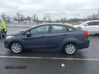 2012 Ford Fiesta SE with VIN 3FADP4BJ0CM155729, listed as a IAAI auction lot 41800447 with 90,091 mi miles. Bid and sale history available at carsss.com. Image 14.