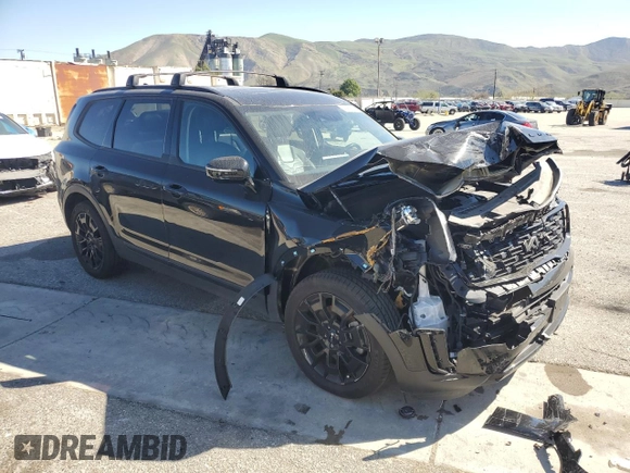 2022 Kia Telluride SX with VIN 5XYP5DHC0NG242472, listed as a Copart auction lot 43958185 with 57,604 mi miles and Salvage title. Bid and sale history available at DreamBid. Image 4.