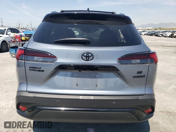 2024 Toyota Corolla Cross Hybrid S z VIN 7MUFBABG8RV049743, wystawiony jako Copart lot #52405635 z przebiegiem 14 426 mil mil oraz Szkoda całkowita • Salvage title. Historia ofert i sprzedaży dostępna na DreamBid. Obrazek 6.