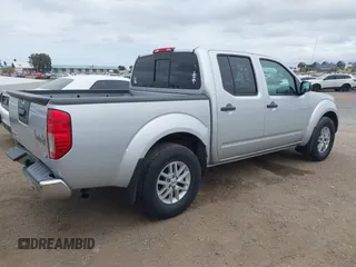 2021 Nissan Frontier SV z VIN 1N6ED0EA4MN712903, wystawiony jako IAAI lot #42126845 z przebiegiem 35 019 mil mil oraz . Historia ofert i sprzedaży dostępna na DreamBid. Obrazek 4.