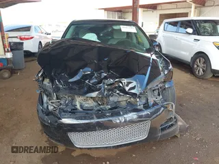 2014 Chevrolet Impala LT with VIN 2G1WB5E34E1158088, listed as a IAAI auction lot 42417592 with 92,995 mi miles and . Bid and sale history available at DreamBid. Image 13.