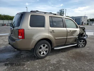 2010 Honda Pilot Touring with VIN 5FNYF3H81AB016255, listed as a Copart auction lot 71052644 with 96,847 mi miles and Salvage Title. Bid and sale history available at DreamBid. Image 3.