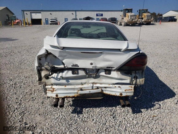 2004 Pontiac Grand Am GT with VIN 1G2NW52E74C189023, listed as a Copart auction lot 78256904 with 209,706 mi miles and Salvage Title. Bid and sale history available at carsss.com. Image 6.