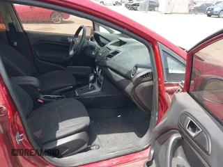 2016 Ford Fiesta SE z VIN 3FADP4BJXGM156814, wystawiony jako IAAI lot #42129721 z przebiegiem 90 353 mil mil oraz . Historia ofert i sprzedaży dostępna na DreamBid. Obrazek 5.