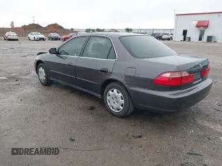1999 Honda Accord LX with VIN 1HGCG5647XA154131, listed as a IAAI auction lot 41962701 with 126,673 mi miles and . Bid and sale history available at DreamBid. Image 3.