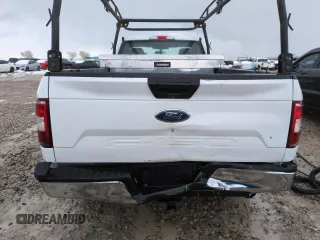 2019 Ford F-150 XL with VIN 1FTMF1CB6KKD26749, listed as a Copart auction lot 49695535 with 115,003 mi miles and Salvage title. Bid and sale history available at DreamBid. Image 6.