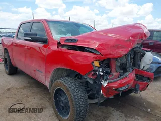 2021 Ram 1500 Lone Star with VIN 1C6RREFT9MN592784, listed as a IAAI auction lot 42469343 with 122,421 mi miles and . Bid and sale history available at DreamBid. Image 1.