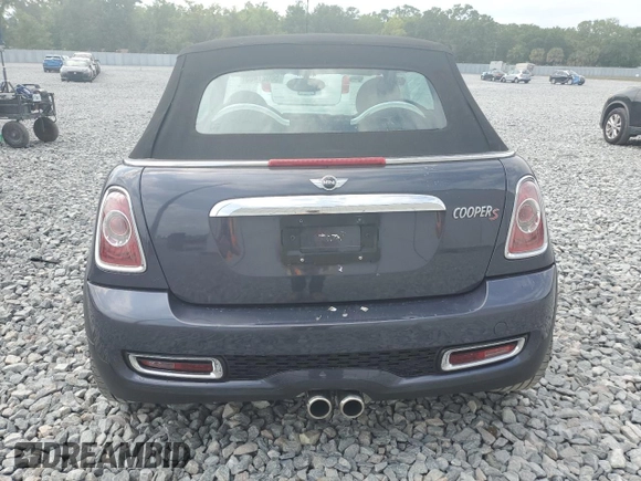 2012 MINI Convertible S with VIN WMWZP3C56CT250886, listed as a Copart auction lot 50027405 with 92,990 mi miles and Salvage title. Bid and sale history available at DreamBid. Image 6.