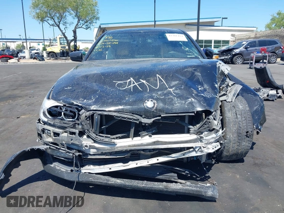 2018 BMW 5 Series 530e with VIN WBAJA9C50JB249995, listed as a IAAI auction lot 42301414 with 179,673 mi miles and . Bid and sale history available at DreamBid. Image 13.