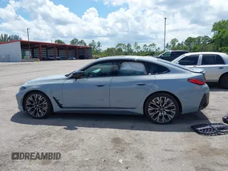 2023 BMW 4 Series M440i z VIN WBA63AW0XPFP50556, wystawiony jako IAAI lot #42517241 z przebiegiem 33 079 mil mil oraz . Historia ofert i sprzedaży dostępna na DreamBid. Obrazek 14.