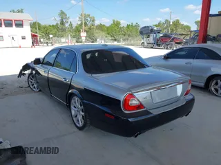2008 Jaguar XJ with VIN SAJWA79B48SH22788, listed as a IAAI auction lot 41530902 with 124,334 mi miles. Bid and sale history available at carsss.com. Image 3.