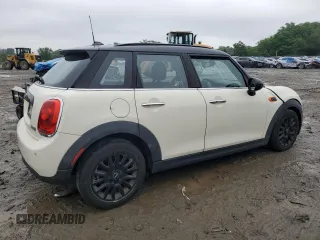 2017 MINI Hardtop 4 Door Cooper with VIN WMWXU1C53H2E18584, listed as a Copart auction lot 61355915 with 56,171 mi miles and Salvage title. Bid and sale history available at DreamBid. Image 3.