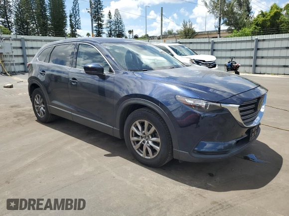 2018 Mazda CX-9 Touring with VIN JM3TCBCY3J0235048, listed as a Copart auction lot 61043915 with 82,869 mi miles and Salvage title. Bid and sale history available at DreamBid. Image 4.