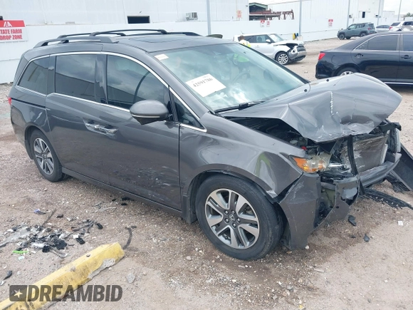 2015 Honda Odyssey Touring Elite with VIN 5FNRL5H99FB089642, listed as a IAAI auction lot 42591786 with 100,755 mi miles and . Bid and sale history available at DreamBid. Image 1.