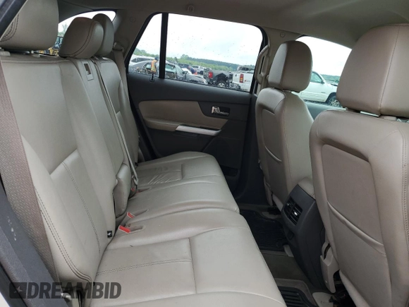 2013 Ford Edge SEL z VIN 2FMDK4JC6DBC06435, wystawiony jako Copart lot #54559065 z przebiegiem 163 407 mil mil oraz Szkoda całkowita • Salvage title. Historia ofert i sprzedaży dostępna na DreamBid. Obrazek 11.