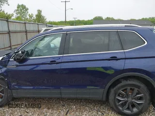 2022 Volkswagen Tiguan SE with VIN 3VV2B7AX8NM098143, listed as a IAAI auction lot 42209345 with 32,891 mi miles and . Bid and sale history available at DreamBid. Image 14.