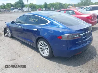 2016 Tesla Model S 70 with VIN 5YJSA1E17GF149479, listed as a IAAI auction lot 42609734 with 175,007 mi miles and . Bid and sale history available at DreamBid. Image 3.