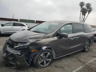 2018 Honda Odyssey Touring with VIN 5FNRL6H89JB056680, listed as a Copart auction lot 60566635 with Not provided miles and Salvage title. Bid and sale history available at DreamBid. Image 1.