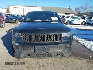 2018 Jeep Grand Cherokee Laredo E with VIN 1C4RJFAGXJC375588, listed as a IAAI auction lot 41406344 with 69,989 mi miles. Bid and sale history available at carsss.com. Image 12.