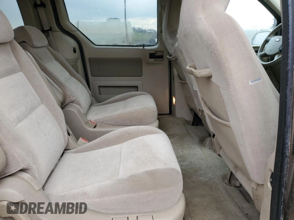 2005 Ford Freestar z VIN 2FMDA57275BA59115, wystawiony jako Copart lot #57058445 z przebiegiem 100 831 mil mil oraz Szkoda całkowita • Salvage title. Historia ofert i sprzedaży dostępna na DreamBid. Obrazek 11.