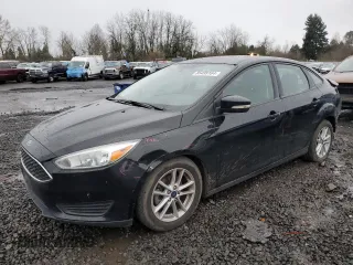 2016 Ford Focus SE with VIN 1FADP3F23GL283953, listed as a Copart auction lot 85499164 with 136,761 mi miles and Salvage Title. Bid and sale history available at carsss.com. Image 1.
