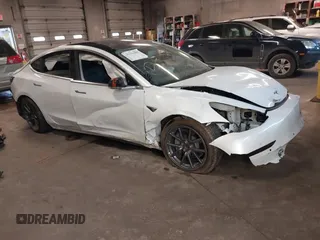 2020 Tesla Model 3 Long Range z VIN 5YJ3E1EB7LF619120, wystawiony jako IAAI lot #41334485 z przebiegiem Nie podano mil oraz . Historia ofert i sprzedaży dostępna na DreamBid. Obrazek 1.