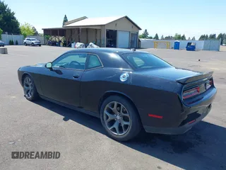 2015 Dodge Challenger SXT Plus with VIN 2C3CDZBGXFH770568, listed as a IAAI auction lot 42164555 with 108,889 mi miles and . Bid and sale history available at DreamBid. Image 3.