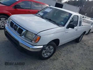 1999 Nissan Frontier XE with VIN 1N6DD26SXXC324508, listed as a IAAI auction lot 41521674 with 297,239 mi miles and . Bid and sale history available at DreamBid. Image 2.